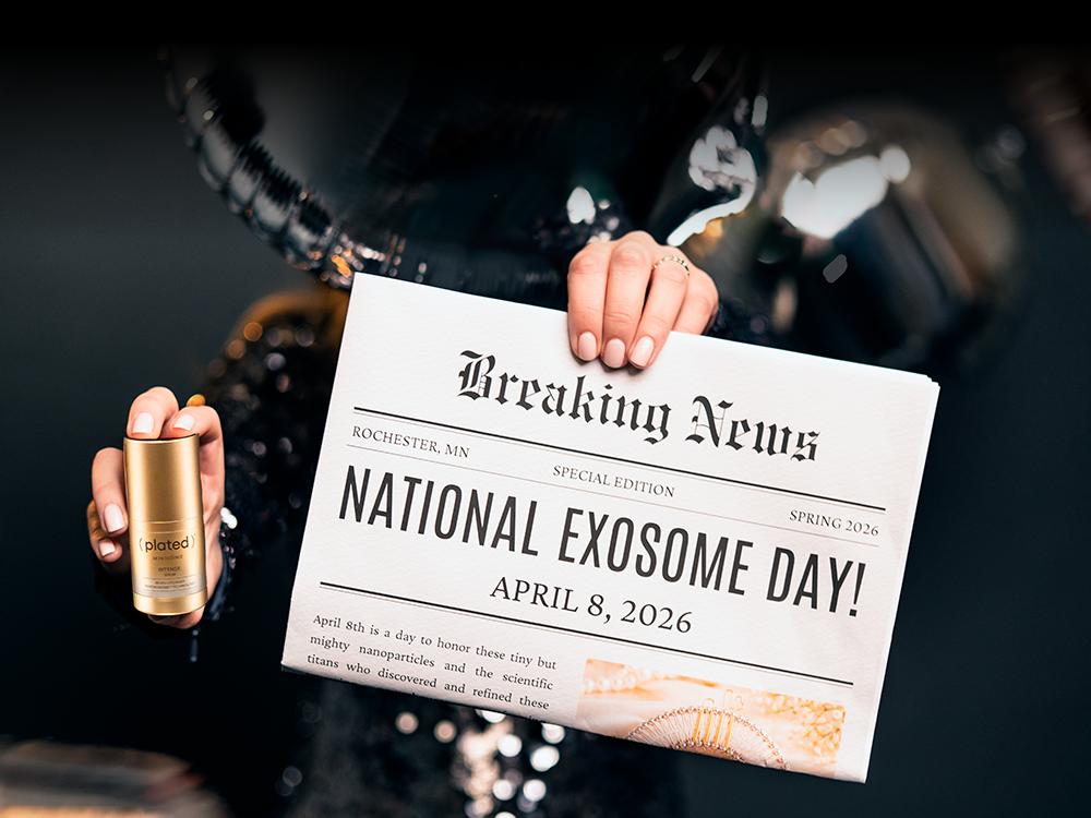 Person holding a newspaper with 'National Exosome Day' text against a dark background